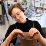 Kate Marotz making a coil vessel by pinching with her hands