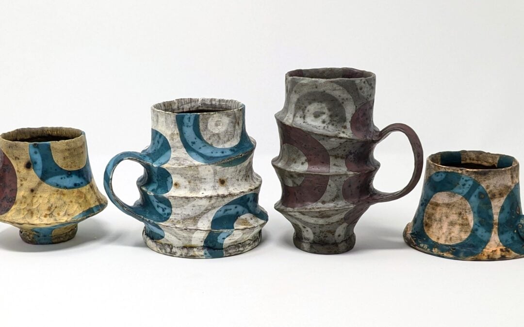 handmade coil and pinched ceramic mugs created and decorated by local Wisconsin artist Kate Marotz